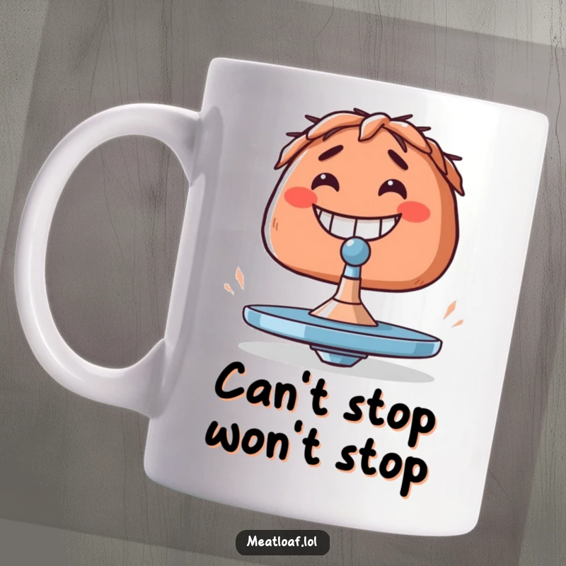 Funny meatloaf mug showing a meatloaf with a big grin, attempting to balance a tiny spinning top.