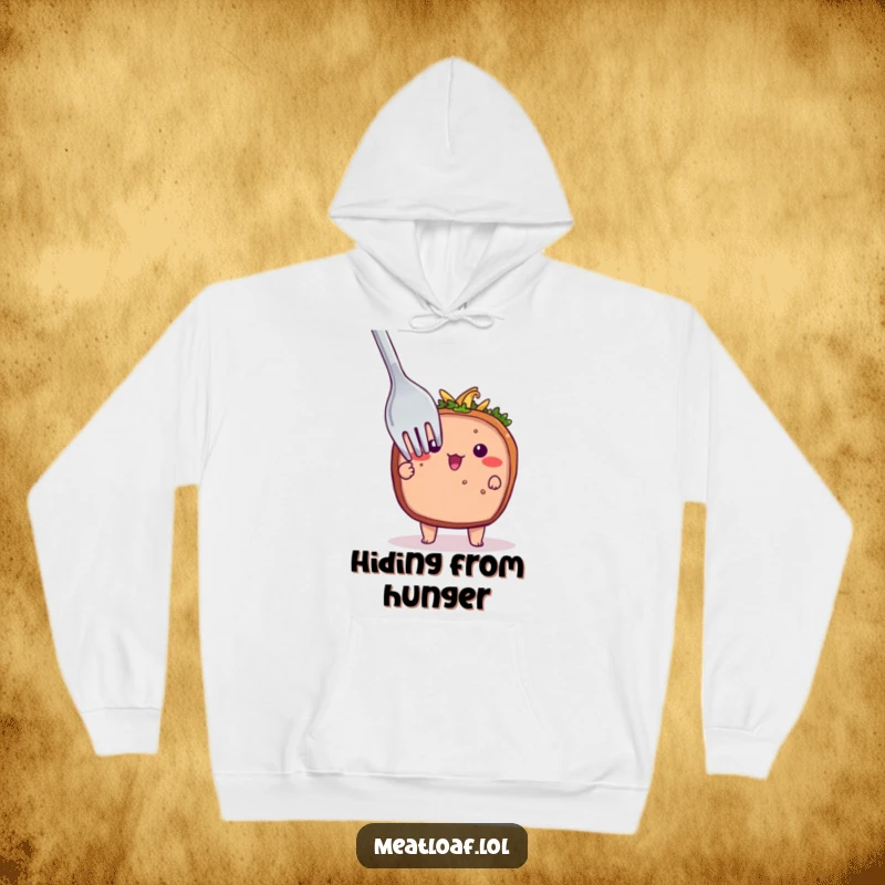 Funny hoodie featuring a bashful meatloaf character hiding behind a large fork, offering warmth and a touch of shy culinary wit.
