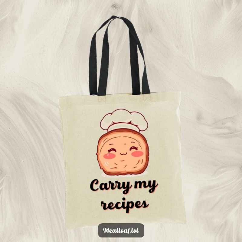 Funny tote bag with a rosy-cheeked meatloaf slice wearing a chef hat, a cute and humorous culinary companion.